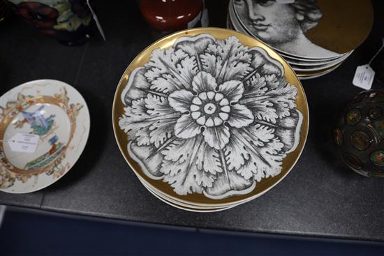 A set of twelve Fornasetti Rosoni pattern plates, Diam.26cm